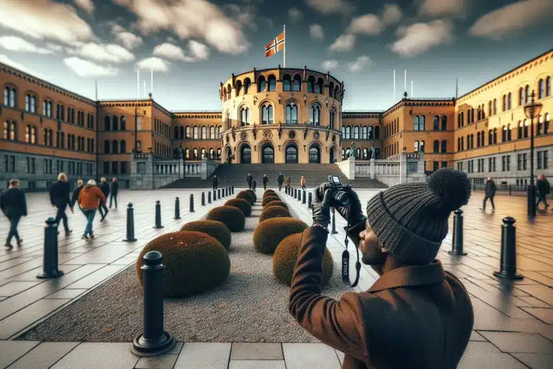 Photographer capturing stortinget from a public sidewalk in oslo norway